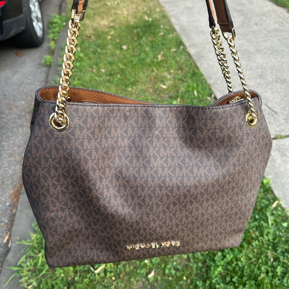 Michael Kors signature canvas with gold-tone hardware
